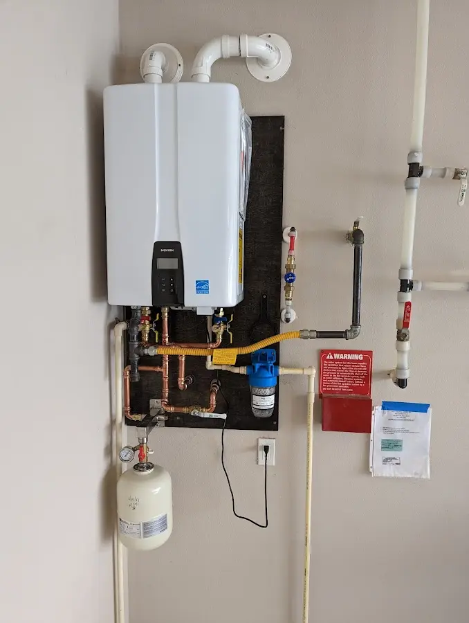 Professional plumber installing copper piping in a Lackawanna home